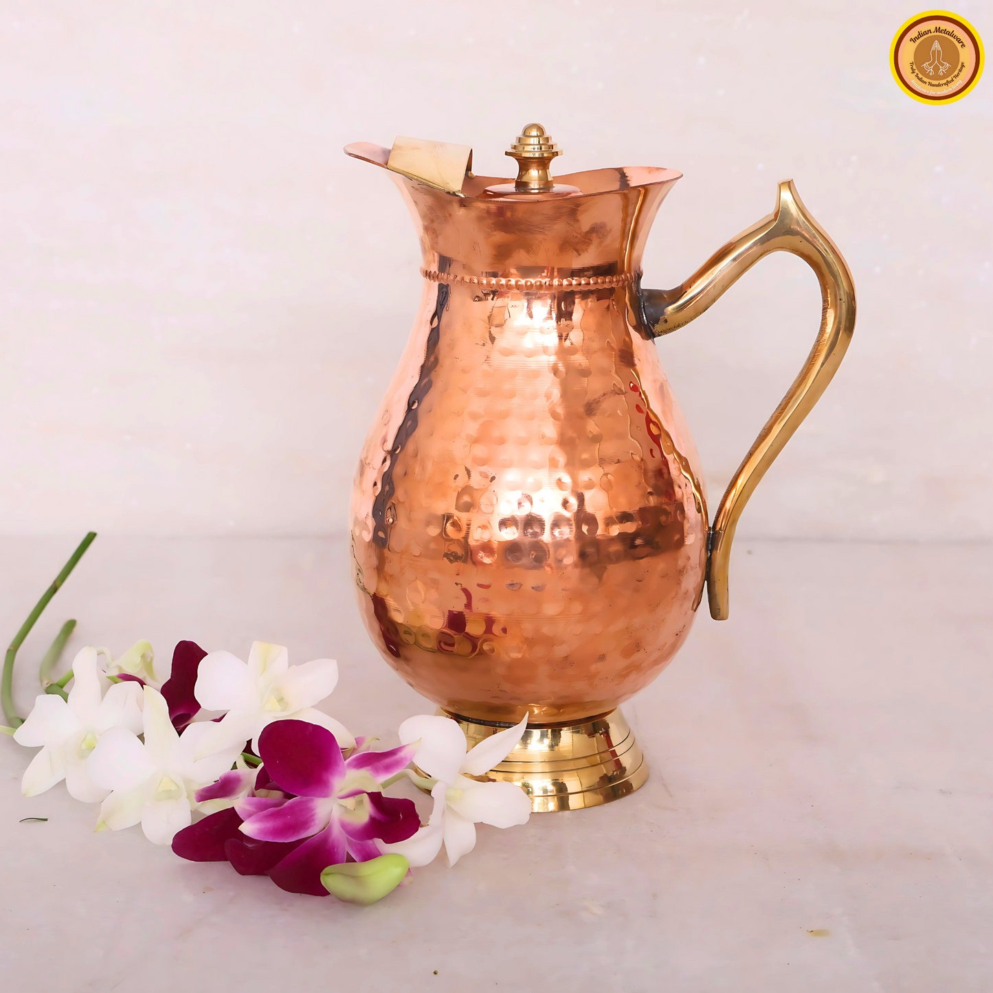 Copper water jug with lid and brass handle