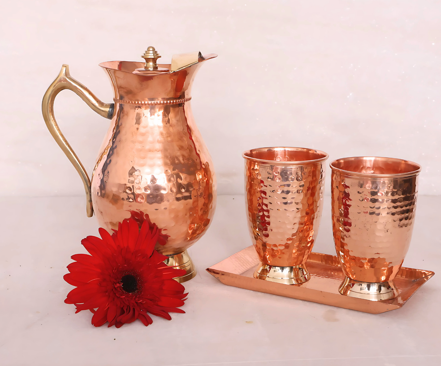 Set of copper jug, glasses, and tray by Indian Metalware
